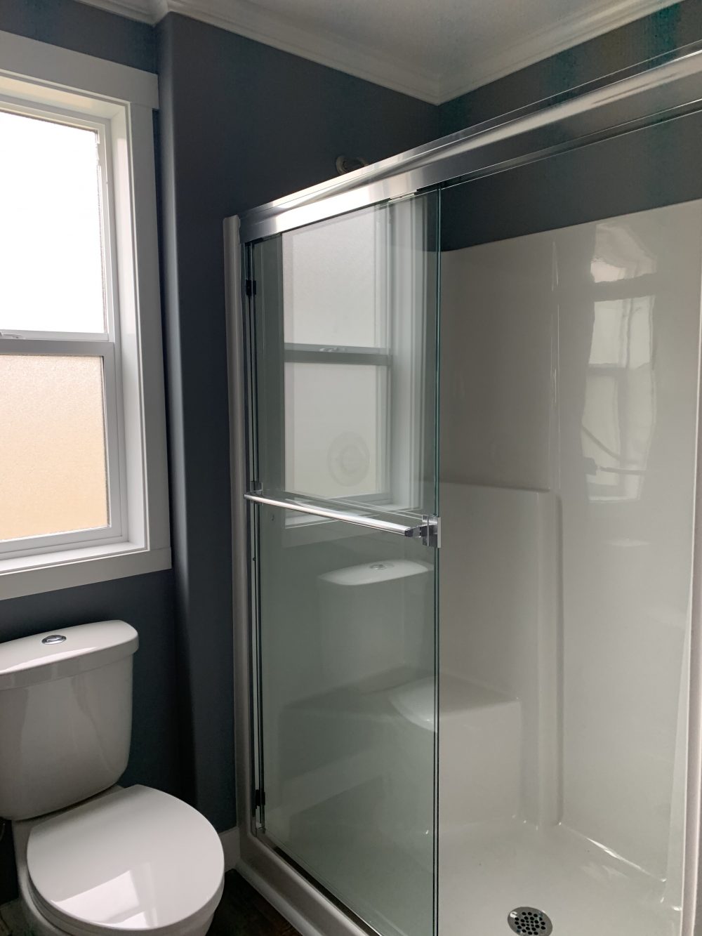 master bath shower with glass doors in the kelowna a showhome built by countryside homes in salmon arm bc